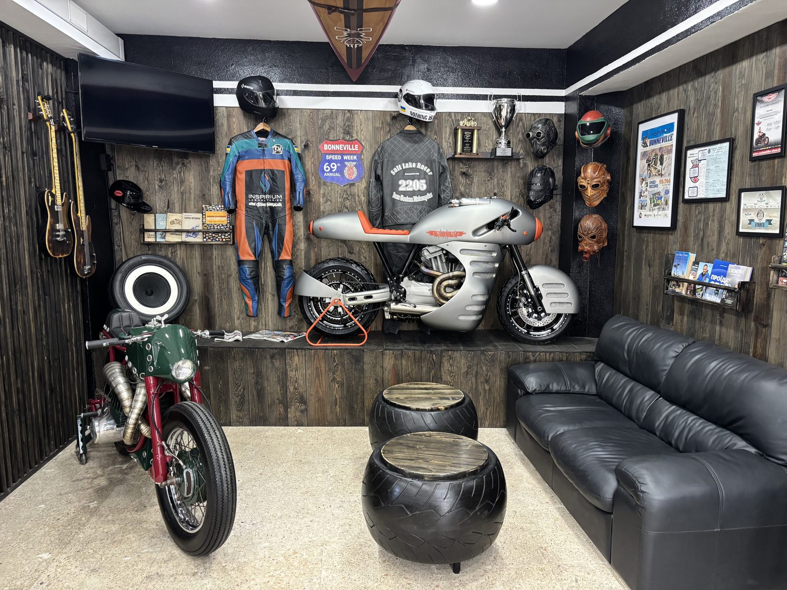 Iron Custom Motors lounge — Inspirium Bonneville bike, racing leathers, trophies and motorcycle culture