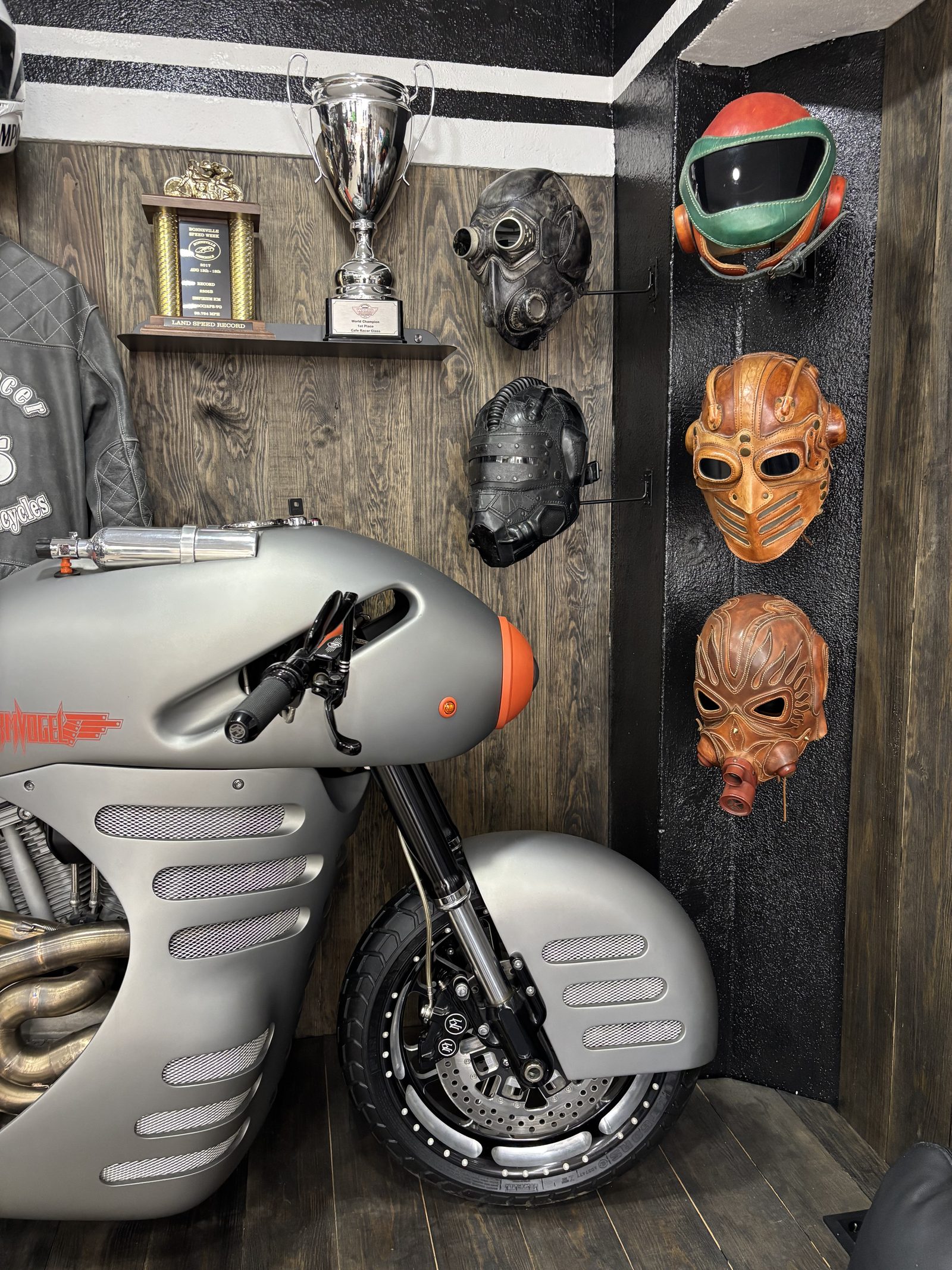 Iron Custom Motors rider lounge with championship motorcycle culture