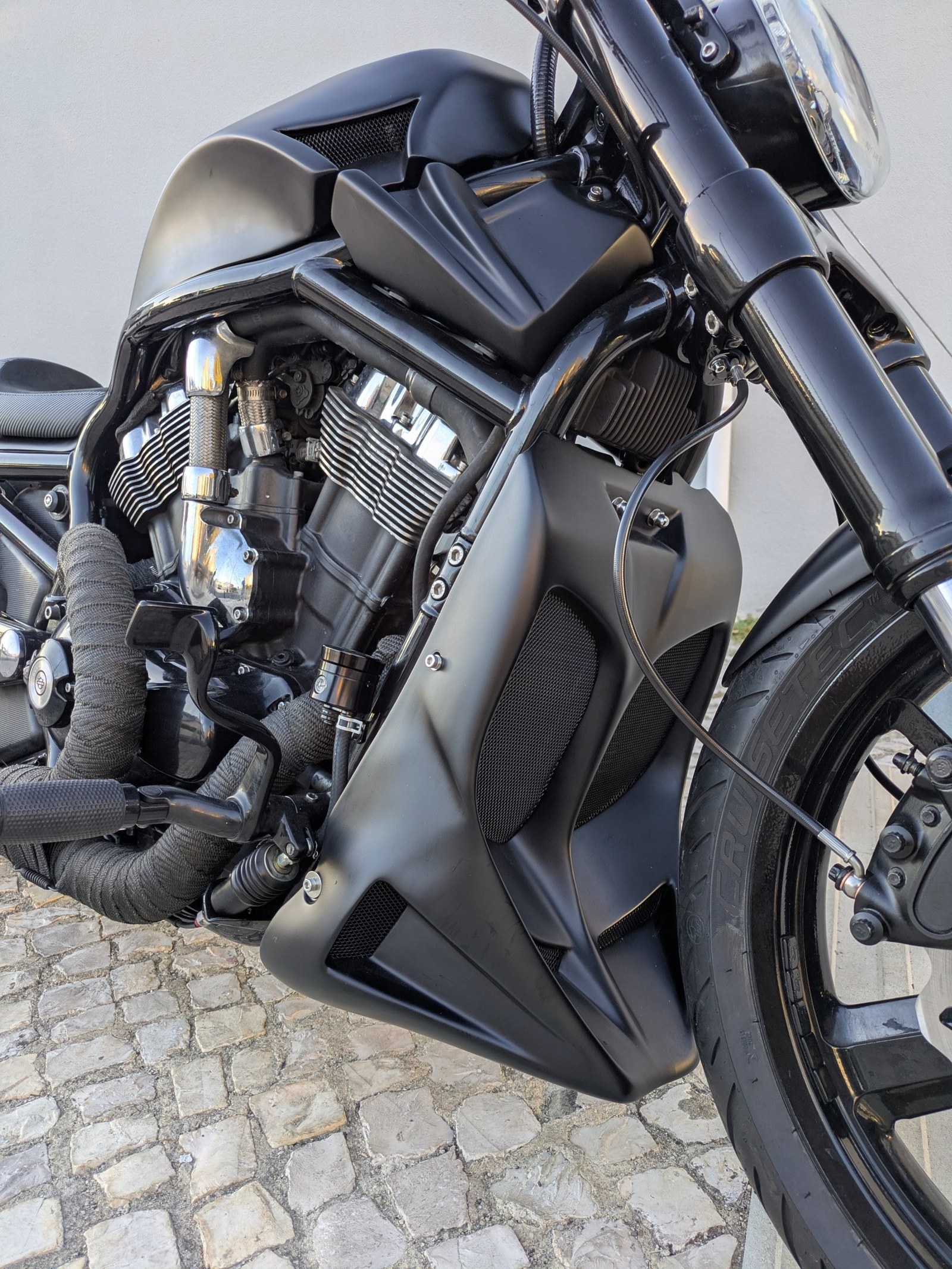 Lower body kit with new mesh, heat-wrapped headers and the Revolution engine