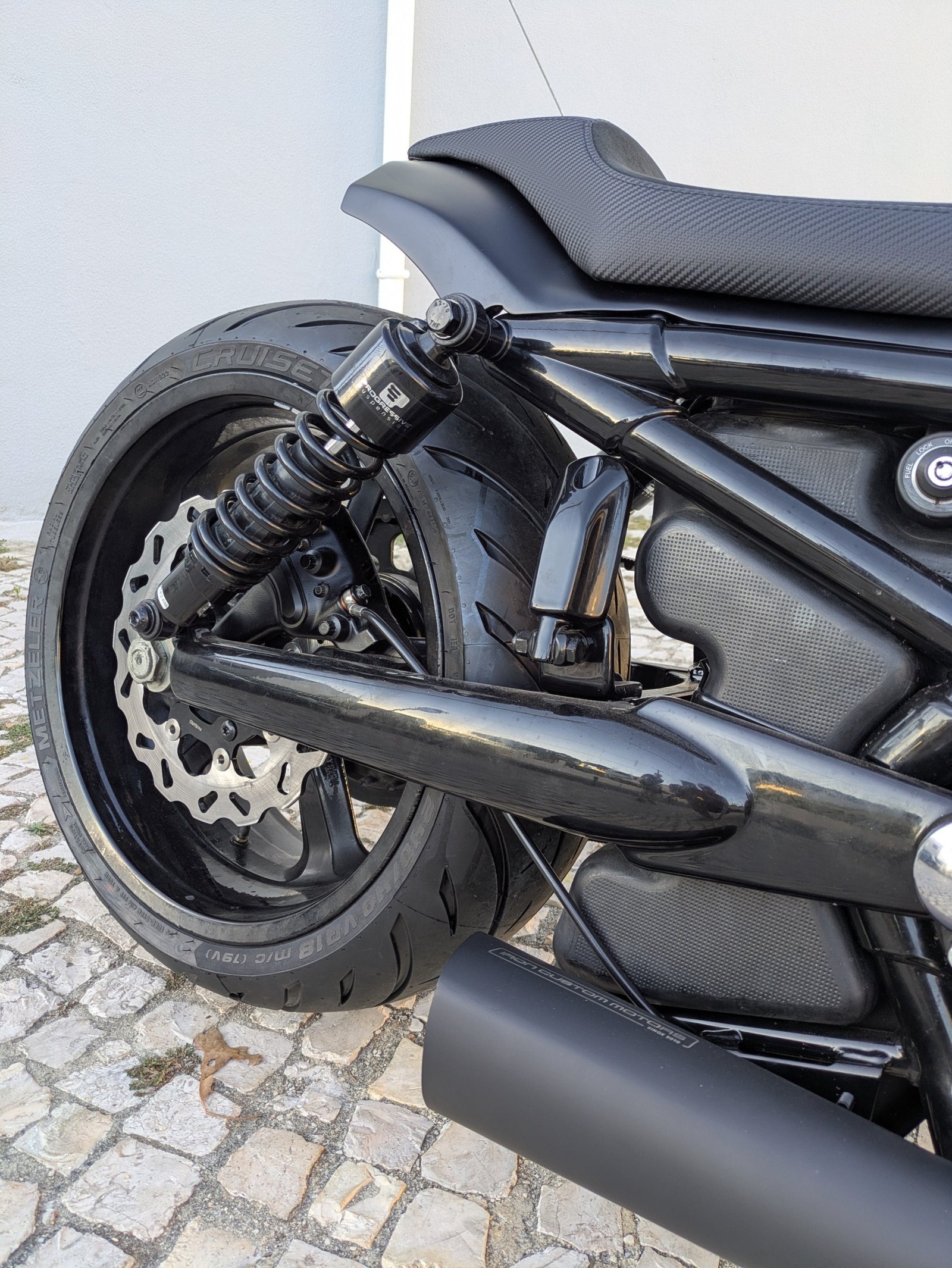 Rear wheel with Progressive Suspension shock, Galfer disc and the Iron Custom Motors silencer
