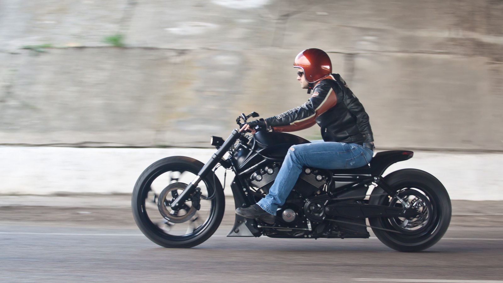The First Night Rod custom in motion with its rider