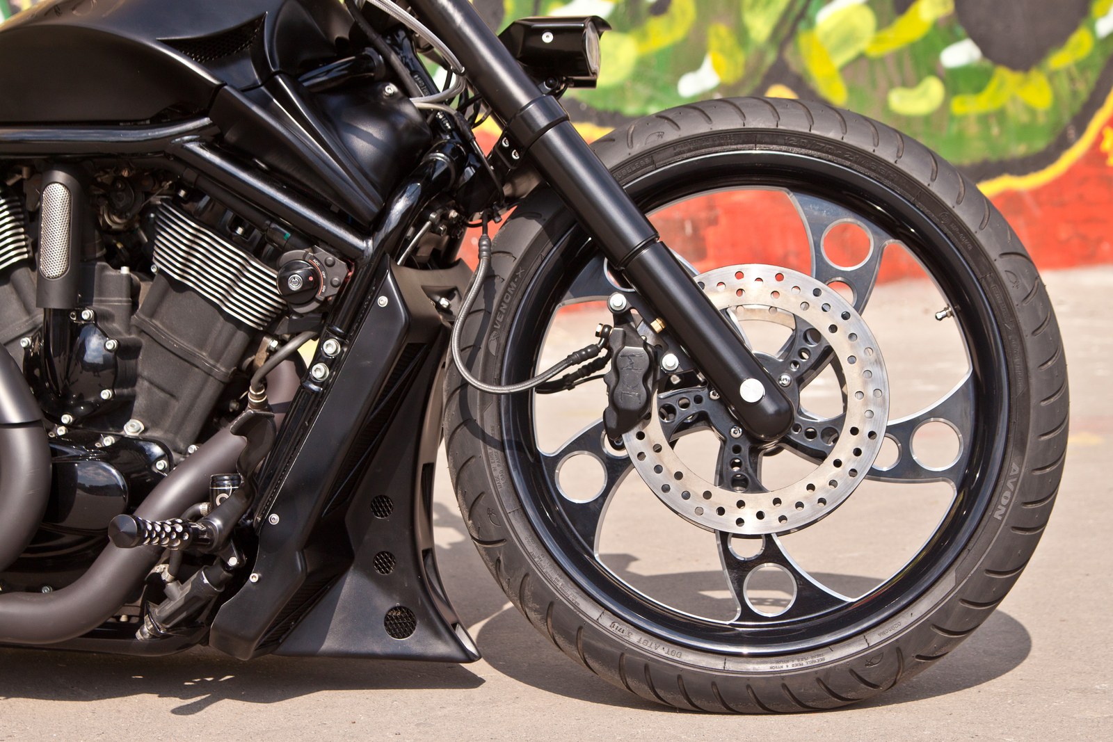 The First front wheel, brake disc and fork detail